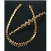 Image 1 : A Continental diamond fringe necklace and a matching bracelet, each composed of yellow metal sati...