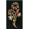Image 1 : A modern multi-gem flower spray brooch, set with old-cut and rose diamonds, small rubies, sapphir...