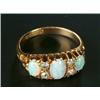 An Edwardian 18ct gold, opal and diamond dress ring, the three graduated oval white opals spaced...