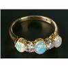 Image 1 : An Edwardian gold, opal and diamond five stone ring, the three oval white opals spaced by early m...