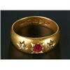 Image 1 : An Edwardian 18ct gold, ruby and diamond three stone gypsy ring, centred with a round mixed-cut r...