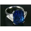 Image 1 : A sapphire and diamond three stone ring, centred with a rectangular step-cut sapphire weighing 13...
