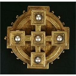 A Victorian gold and half-pearl locket-back brooch, the shaped-round and engraved panel with a be...