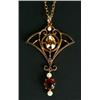 Image 1 : An Edwardian gold, zircon, garnet and pearl pendant of openwork double scroll design, stamped '9c...