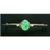 Image 1 : A collection of brooches, comprising; an Art Deco jadeite and diamond brooch centred with an oval...