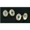 Image 1 : A pair of early 20th century gold, emerald, diamond and mother-of-pearl oval cufflinks, each with...
