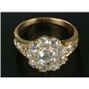 Image 1 : An early 20th century gold and diamond ten stone cluster ring, centred with an Edwardian-cut ston...