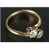 Image 1 : A diamond two stone cross-over ring, the old-cut stones approx. 0.33cts each, claw set in white a...
