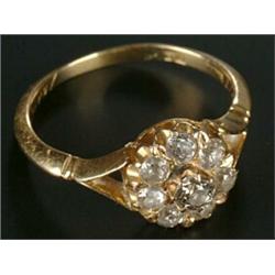 An Edwardian gold and diamond eight stone cluster ring, the old-cut stones approx. 0.66cts total,...