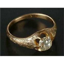 A Victorian gold and diamond solitaire gypsy ring, the old-cut stone approx. 0.57cts, claw set be...