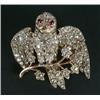 Image 1 : A late Victorian diamond brooch in the form of an owl standing on a branch, set throughout with o...