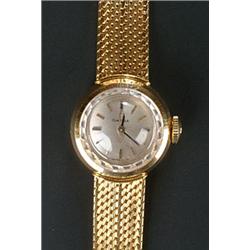 Omega, a lady's 18ct yellow gold bracelet watch, circa 1970, no.633026, white dial with baton num...