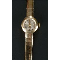 Rolex, Precision, a lady's 9ct gold round bracelet watch, circa 1961, silvered dial with baton nu...