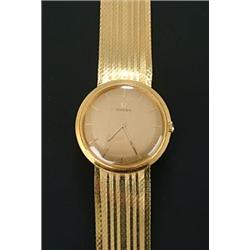 Omega, a gentleman's 18ct gold round bracelet watch, circa 1964, no.3115525, brushed gold dial wi...