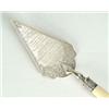 Image 1 : A Victorian presentation trowel with ivory handle, the blade with leaf and scroll engraved border...