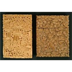 Three wood card cases, comprising; a late 19th century Chinese sandalwood case carved in high rel...