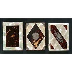 Three tortoiseshell and mother of pearl rectangular purses, one decorated with diamond shaped pan...