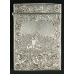 A Victorian Scottish silver card case, the front engraved with a view of Dunegan Castle, Skye, wi...