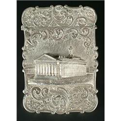 A Victorian silver 'castle top' card case of shaped outline, chased with a view of The Royal Exch...