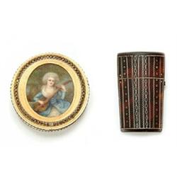 A late George III tortoiseshell pique etui, of tapering oval form decorated with bands of wriggle...