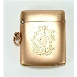 A 9ct rose gold vesta/match case, concave and engraved with a monogram, Chester 1907 by W Neale &...