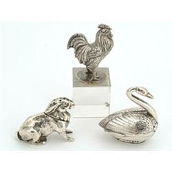 A collection of miniature silver, comprising; a pepper pot in the form of a rabbit, Birmingham 19...