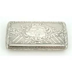 A Victorian silver oblong snuff box with flush hinged cover engine turned and engraved with folia...