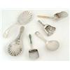 Image 1 : A collection of George III and later caddy spoons and other items, comprising; two old English pa...