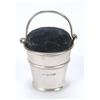 Image 1 : A pin cushion in the form of a bucket with a moulded band and a swing handle, Rd.604193, Birmingh...