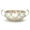 Image 1 : A small lobed round punch bowl, part spiral fluted with two caryatid handles, London 1951, 19.5cm...