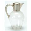 A late Victorian silver mounted glass claret jug, the hinged cover with a crest and motto, London...