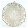 Image 1 : A George II salver with a shaped moulded border on three hoof feet, later flat chased with traili...