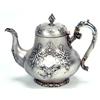 Image 1 : A Victorian baluster shaped teapot, embossed with interlacing, flowers, leaves and shield cartouc...