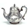 Image 1 : A Victorian baluster shaped teapot, embossed with interlacing, flowers, leaves and shield cartouc...