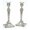 Image 1 : A pair of neo-classical style candlesticks with urn shaped capitals, detachable beaded drip pans,...