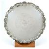 Image 1 : A George III old Sheffield plate salver with a shaped and applied shell and scroll border and fou...