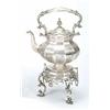 Image 1 : A facetted tea kettle on a stand with a lamp, engraved with flowers and scrolls with a leaf chase...