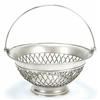 Image 1 : A George III Sheffield round cake basket with basket weave sides, a swing handle and a gadrooned...