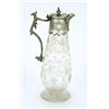 Image 1 : A baluster shaped cut glass claret jug with chased engraved mounts and a scroll handle with bird...