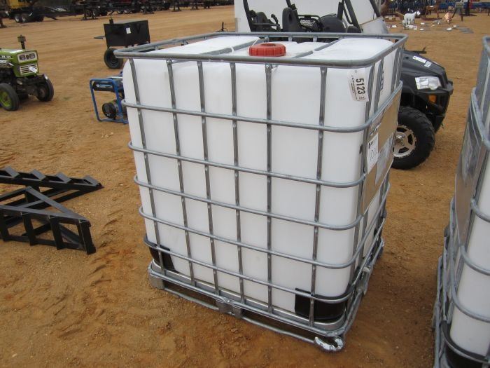 300 GALLON PLASTIC TANK W/METAL CAGE - J.M. Wood Auction Company, Inc.