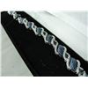 Image 2 : QUARTER CARAT BLUE & WHITE DIAMOND DRAM TWIST STYLE BRACELET 100 DIAMONDS. INCLUDES $650 CERTIFICATE