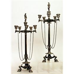 A pair of late Victorian plated six branched candelabra, circa 1900, with cast female figural snu...
