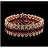 Image 1 : 14KT Rose Gold 44.70ctw Ruby and Diamond Bracelet