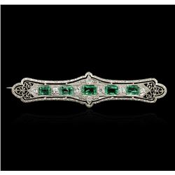 18KT White Gold 1.30ctw Emerald and Diamond Brooch