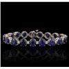 Image 1 : 14KT White Gold 30.21ctw Sapphire and Diamond Bracelet