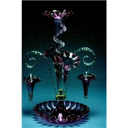 A Victorian Cranberry Glass Epergne, English, c.1870, The vasiform central column flanked by a p...