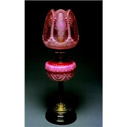A Victorian Pink Glass Oil Lamp, English, late 19th century, The circular campana style pink gla...