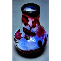 A Daum Cameo Glass Vase, French, early 20th century, engraved signature., The mauve to milky opa...