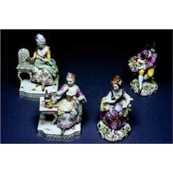 A pair of Porcelain Figures, German, 19th/20th century, The richly polychrome painted and gilded...