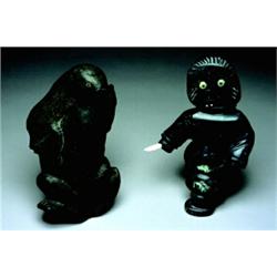 R. Porter, Possibly, Gjoa Haven, signed & dated 1993, The mottled grey stone carving depicting a...